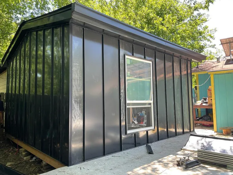 Black standing seam metal wall panels for Metal Roof Installation in South Charleston